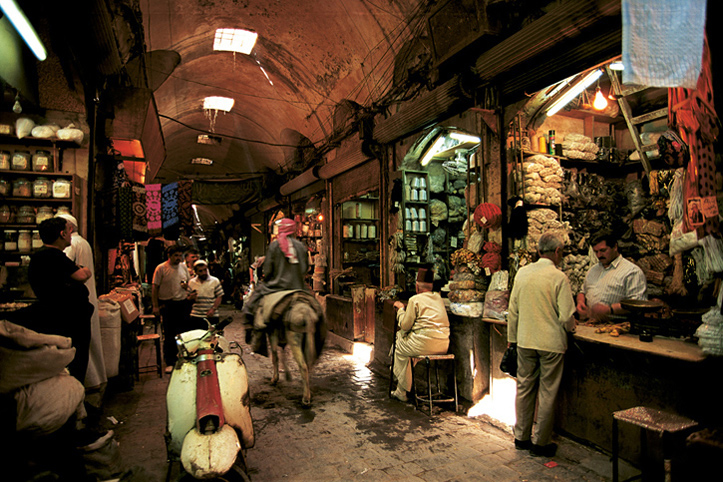 Syria. Aleppo. Merchants in the souq